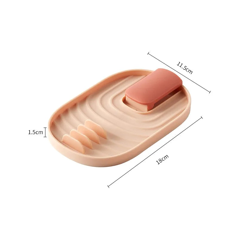 pink spatula and lid holder
