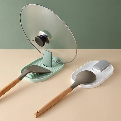 spatula and lid holder on kitchen counter
